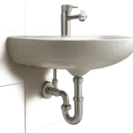Illustration d’un siphon de lavabo propre et facile à entretenir dans une salle de bain moderne. L’image met en avant la prévention des odeurs et la simplicité d’usage au quotidien.